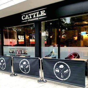 Cattle Steakhouse signs and banners